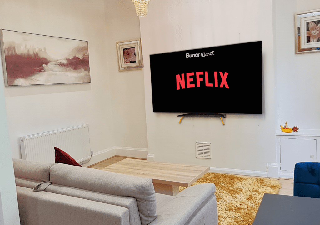 DALL·E 2023-07-04 14.45.56 - add realistic smart tv, hd quality, smart tv with netflix playing. high quality picture, realistic